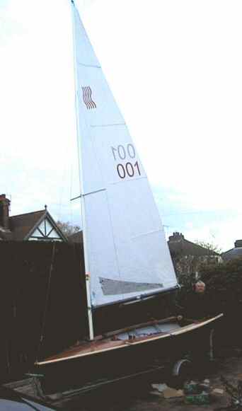 Stuart Gurney hoists Heatwave's sail for the first time, 28 November 2003