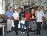 The boys receive acknowledgment of their work: Rear Admiral Koos Louw presented the prizes, assisted by Ms. Vanessa Davidson, the Skills Development Facilitator at the CTBi.